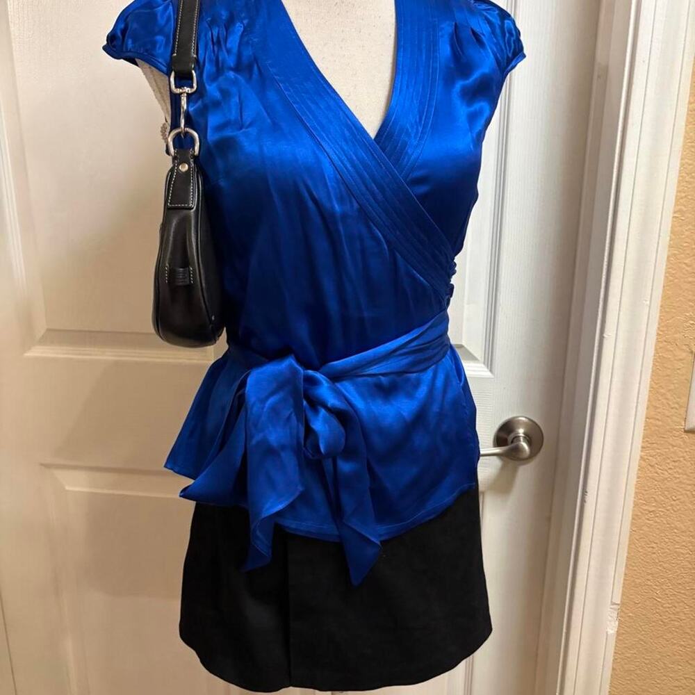 INC International Concepts blue silk wrap style top. Size 2